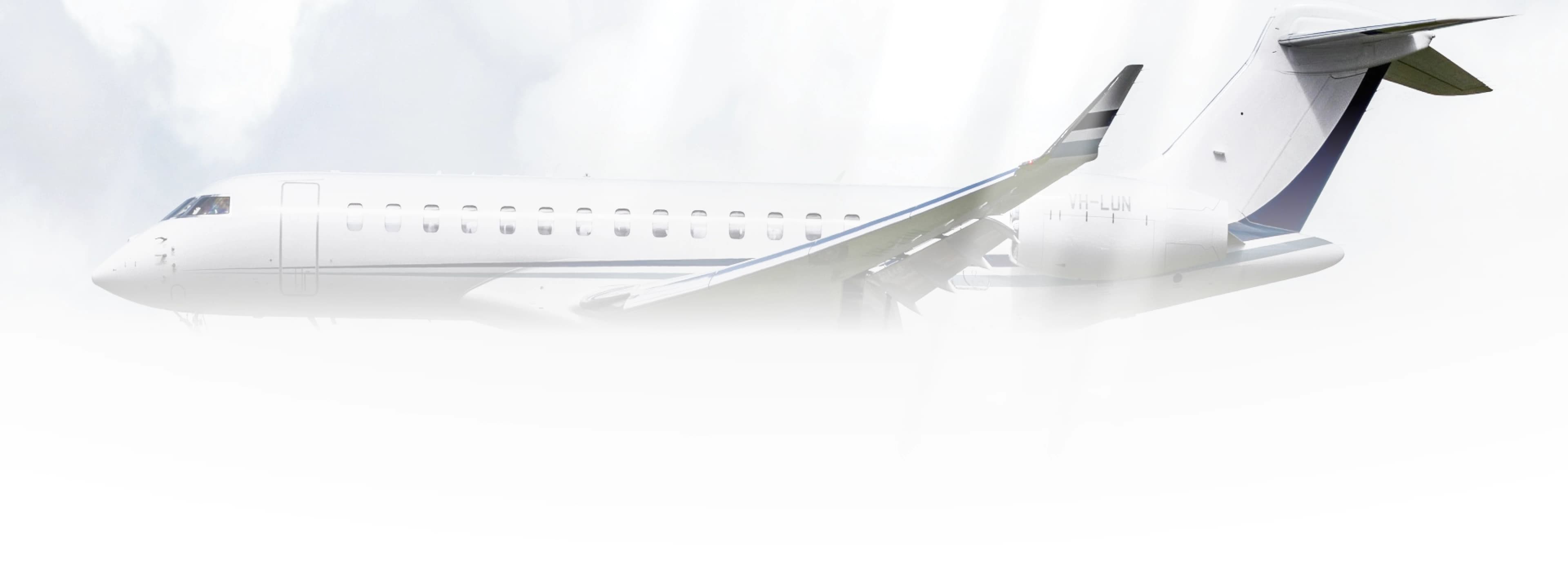 Private jet flying over mountains